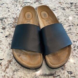 Black leather slides